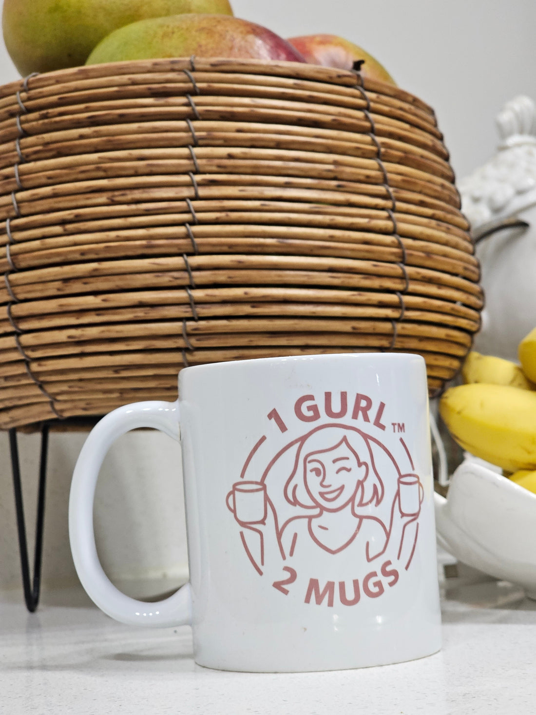 Aesthetic photo of a ceramic mug placed on kitchen counter next to fruits . perfect for showcasing summer vibes and gift ideas.