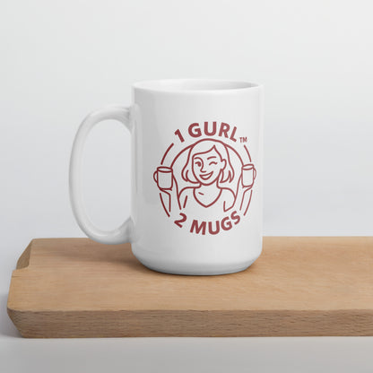 White mug with red logo and text on a wooden surface